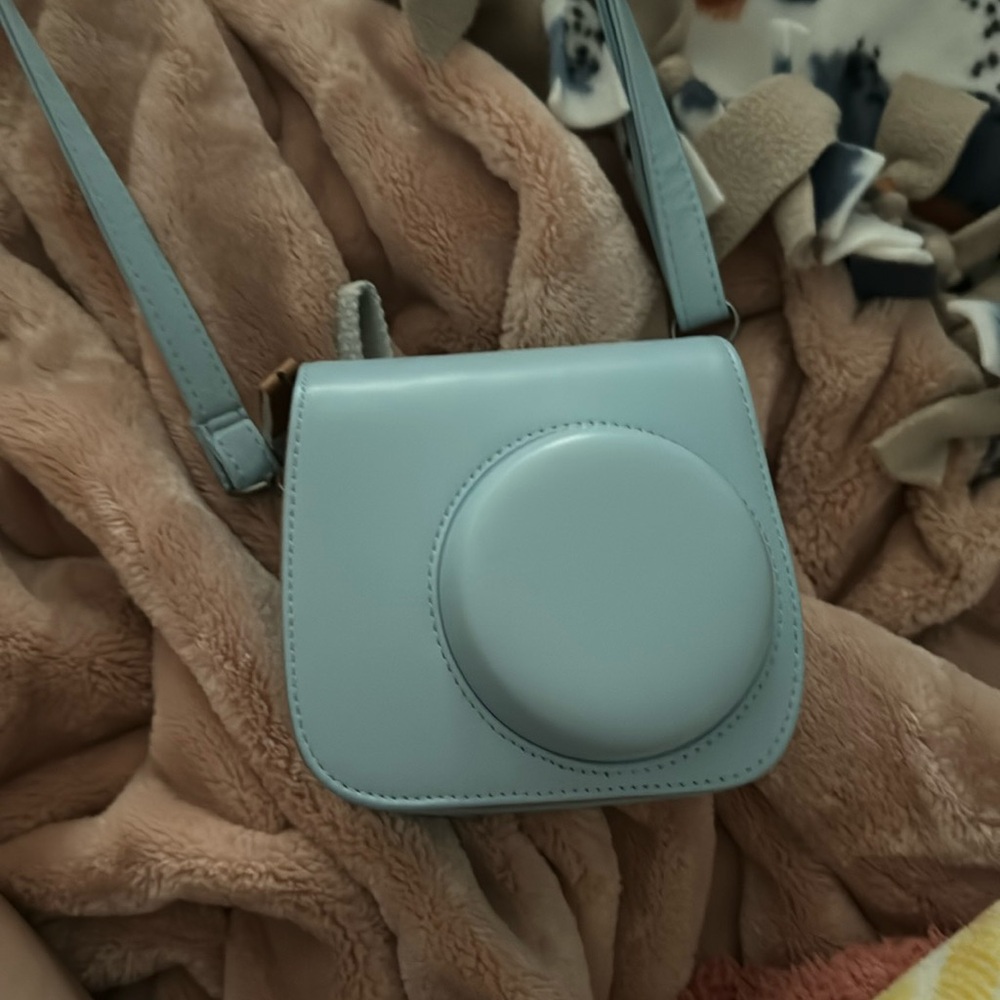 White insta camera and case